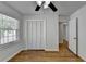 Spacious bedroom with hardwood floors and ceiling fan at 1365 Renee Dr, Decatur, GA 30035
