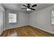 Bright bedroom with hardwood floors and ceiling fan at 1365 Renee Dr, Decatur, GA 30035