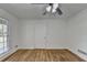 Bright bedroom with hardwood floors and a ceiling fan at 1365 Renee Dr, Decatur, GA 30035