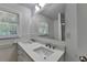 Modern bathroom with double vanity and white quartz countertop at 1365 Renee Dr, Decatur, GA 30035