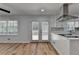 Modern kitchen with stainless steel appliances and white cabinets at 1365 Renee Dr, Decatur, GA 30035