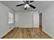 Spacious bedroom featuring hardwood floors and a ceiling fan at 1365 Renee Dr, Decatur, GA 30035