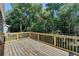 Spacious wooden deck with a view of the trees at 1365 Renee Dr, Decatur, GA 30035