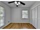 Bright bedroom, featuring hardwood floors and window at 1365 Renee Dr, Decatur, GA 30035