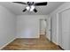 Spacious bedroom featuring hardwood floors and a ceiling fan at 1365 Renee Dr, Decatur, GA 30035
