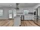 Modern kitchen with island and stainless steel appliances at 1365 Renee Dr, Decatur, GA 30035