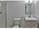 Clean bathroom with a walk-in shower and modern vanity at 1365 Renee Dr, Decatur, GA 30035