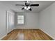Spacious bedroom with hardwood floors and ceiling fan at 1365 Renee Dr, Decatur, GA 30035