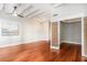 Spacious living room featuring hardwood floors and a ceiling fan at 32 Peachtree Nw St # 1104, Atlanta, GA 30303