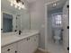 Clean bathroom with vanity, toilet and bathtub at 2001 Towne Lake W Hls, Woodstock, GA 30189