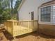 Small wooden deck with railing next to the house at 2961 Hawk Se Ct, Marietta, GA 30067