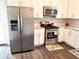 Stainless steel appliances and white shaker cabinets in kitchen at 2961 Hawk Se Ct, Marietta, GA 30067