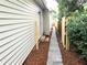 Sidewalk along the home providing backyard access at 2961 Hawk Se Ct, Marietta, GA 30067