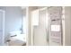 Bathroom with soaking tub and shower, offering ample space and storage at 541 Richmond Pl, Loganville, GA 30052