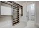 Large walk-in closet with ample shelving and hanging space at 1065 Peachtree Ne St # 3201, Atlanta, GA 30309