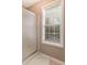 Bathroom with a shower and window at 215 Mackenzie Ct, Canton, GA 30115