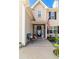 Inviting front entry with decorative door and stone accents at 215 Mackenzie Ct, Canton, GA 30115