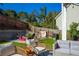 Private backyard with patio, seating area, and fire pit at 215 Mackenzie Ct, Canton, GA 30115