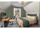 Cozy bedroom with a desk, bed, and stylish decor at 215 Mackenzie Ct, Canton, GA 30115