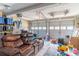 Spacious garage with room for storage and a comfortable seating area at 215 Mackenzie Ct, Canton, GA 30115