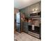 Updated kitchen featuring stainless steel appliances and granite countertops at 215 Mackenzie Ct, Canton, GA 30115