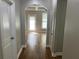 Bright hallway with hardwood floors and access to other rooms at 3923 High Dove Sw Way # 16, Smyrna, GA 30082