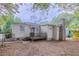 Home with a large backyard and wooden deck at 2519 Godfrey Nw Dr, Atlanta, GA 30318
