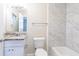 Updated bathroom with granite countertop and marble tile at 2519 Godfrey Nw Dr, Atlanta, GA 30318