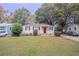 Charming white brick ranch home with a red door at 2519 Godfrey Nw Dr, Atlanta, GA 30318