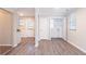 Bright laundry room with built-in shelving and vinyl flooring at 2519 Godfrey Nw Dr, Atlanta, GA 30318