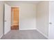 Bedroom with carpet flooring and access to the bathroom at 2519 Godfrey Nw Dr, Atlanta, GA 30318