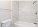 Clean bathroom with marble tile shower/tub combo at 2519 Godfrey Nw Dr, Atlanta, GA 30318