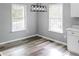 Spacious dining area with gray walls and wood-look flooring at 775 Humphries Sw St, Atlanta, GA 30310