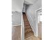 Carpeted staircase leading to the upper level of the home at 4811 West Gate Blvd, Atlanta, GA 30349