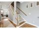 Staircase with wooden railings leading to the upper floor at 1122 Providence Pl, Decatur, GA 30033