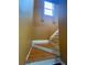 Wooden staircase with white trim leading to the upper level at 2594 Boulder Springs Pt, Ellenwood, GA 30294