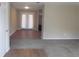 Spacious living room with carpet and french doors at 8060 Northcrest Dr, Jonesboro, GA 30238