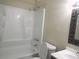 Updated bathroom with tub, shower, and vanity at 8060 Northcrest Dr, Jonesboro, GA 30238