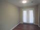 Bright dining room with hardwood floors and french doors at 8060 Northcrest Dr, Jonesboro, GA 30238