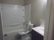 Clean bathroom featuring a shower/tub combo, toilet, and vanity at 8060 Northcrest Dr, Jonesboro, GA 30238