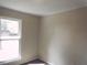 Well-lit bedroom with neutral walls and carpet at 8060 Northcrest Dr, Jonesboro, GA 30238