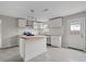 Modern kitchen with island and white cabinetry at 96 Portland, Jonesboro, GA 30238