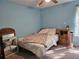 Cozy bedroom with carpeted floor and a window at 305 Melton Way, Covington, GA 30016