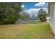 Large backyard with wooden fence at 1712 Graystone Dr, Hampton, GA 30228