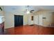 Open living space with hardwood floors and access to backyard at 1712 Graystone Dr, Hampton, GA 30228