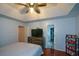 Spacious bedroom with wood floors and a walk-in closet at 1712 Graystone Dr, Hampton, GA 30228