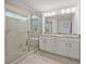 Large bathroom with double vanity and walk-in shower at 2126 Seavey Dr, Decatur, GA 30032