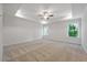 Bright and airy bedroom with ceiling fan and carpet at 2126 Seavey Dr, Decatur, GA 30032