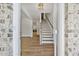 Bright entryway with hardwood floors and staircase at 2126 Seavey Dr, Decatur, GA 30032