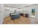 Modern kitchen with granite island and stainless steel appliances at 2126 Seavey Dr, Decatur, GA 30032